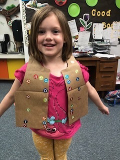 We've been working hard on our letters and sounds. We celebrated by making a vest with letter stickers on them.
