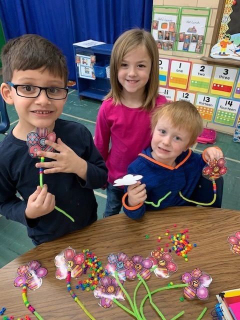 KA was counting with beads this morning.
