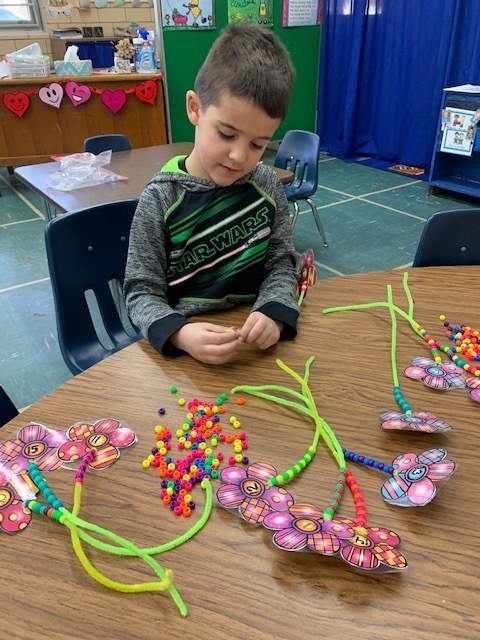 KA was counting with beads this morning.